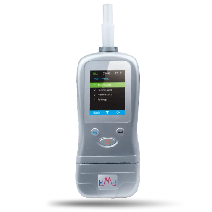 Handheld medical device with a disposable mouthpiece extended from the top, gray body, and a color touchscreen showing a menu (Active Mode, History Data, Settings).